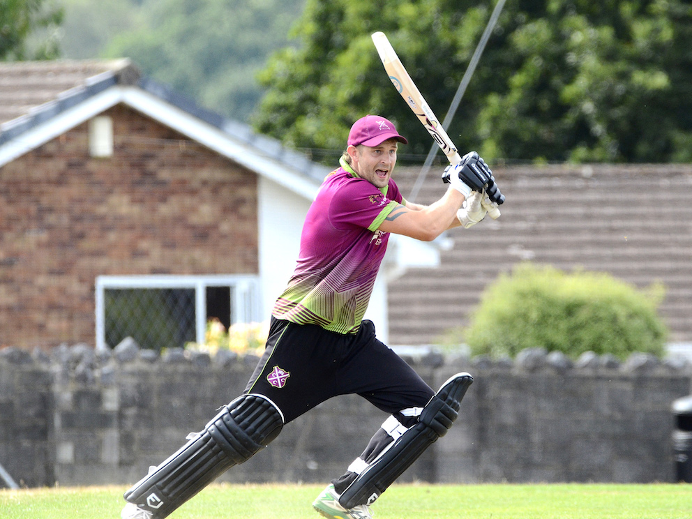 Cullompton's Jason Parr slaps the bowling through the covers