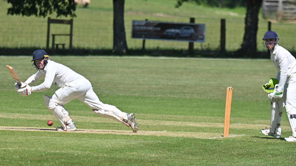 Abbotskerswell's Tom Heath works the South Devon bowling down to fine-leg