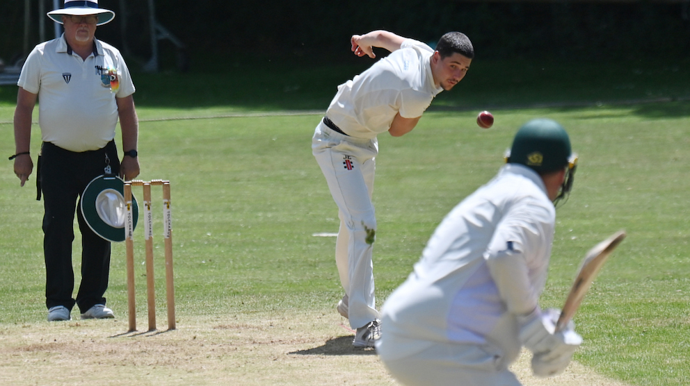 Jack Edworthy running up the hill to bowl in Ipplepen's win over Cornwood 2nd XI<br>credit: Steve Pope – no re-use without rights owner's consent