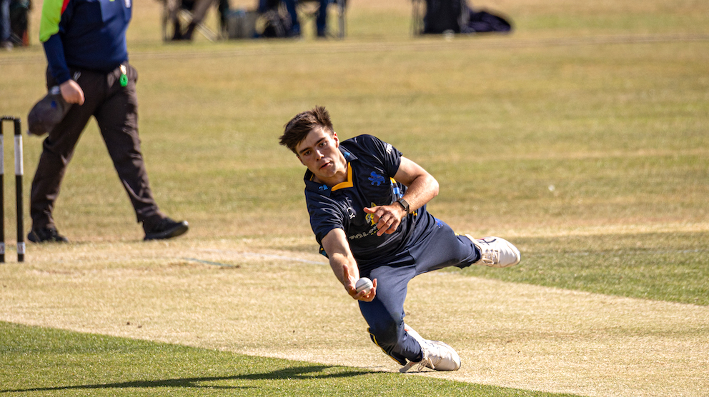 Devon new boy James Matravers made an instant impact in the game against Somerset with this second-ball return catch to dismiss Theo Lamey<br>credit: Julen Beer/DCF – no re-use without rights owner's consent