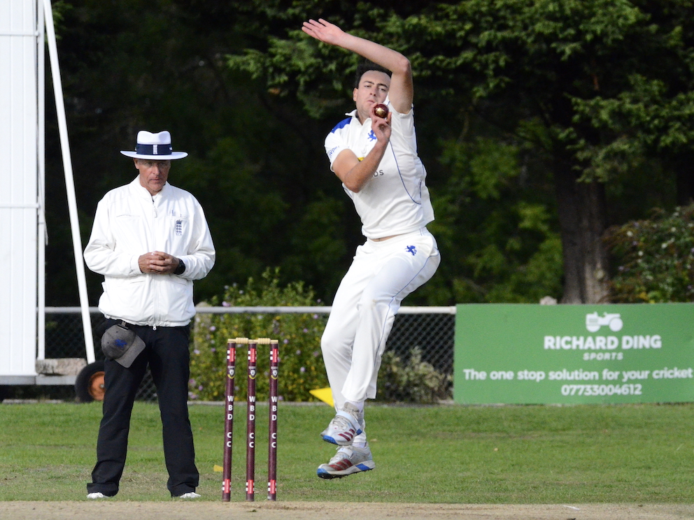 Devon's George Daldorph leaps into his delivery stride armed with the new ball