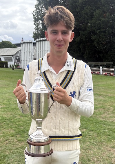 Devon's man-of-the-match Sam Elstone with the National Counties Champion's Trophy