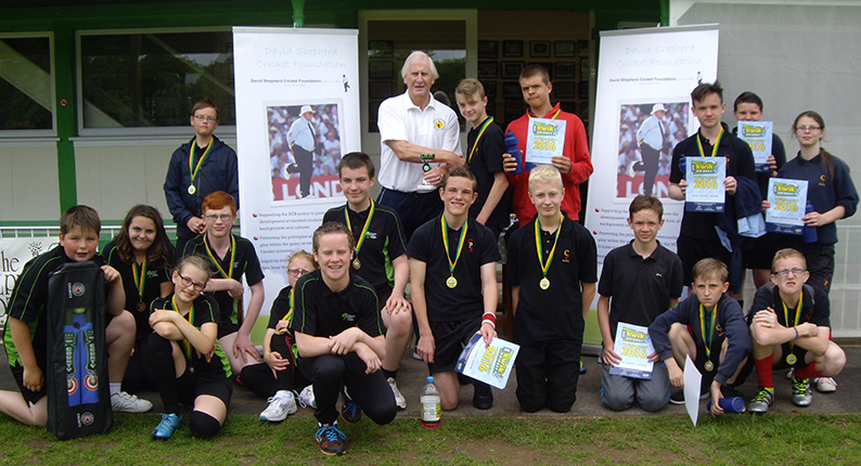 Runners-up Combe Pafford School with their medals and young facilitators from Newton Abbot College on the left