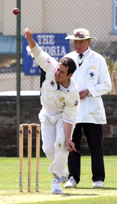 Alan Marsh keeping an eye on proceedings during a game against Budleigh from the 2009 season. Lewis Baker is the bowler