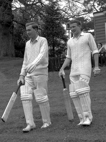 Derek Semmence (left) striding down the hill at Cockington to open the batting with Malcolm Kerr