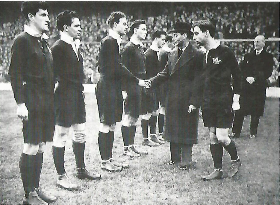 Tony Sutton being introduced to King George VI prior to his appearance in the Varsity Match at Twickenham