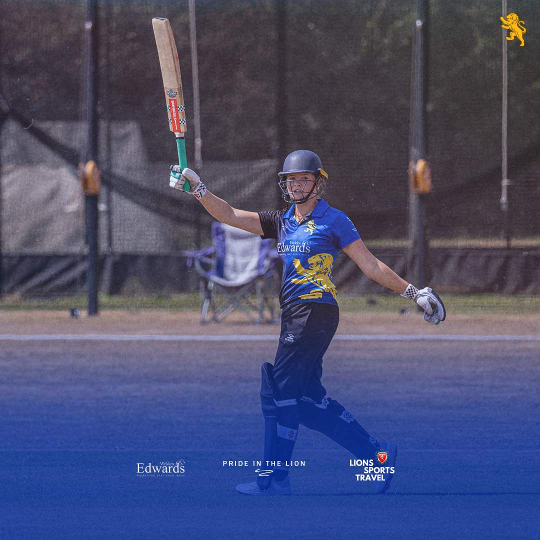 Amelie Webber celebrates hitting 50 against Gloucestershire.