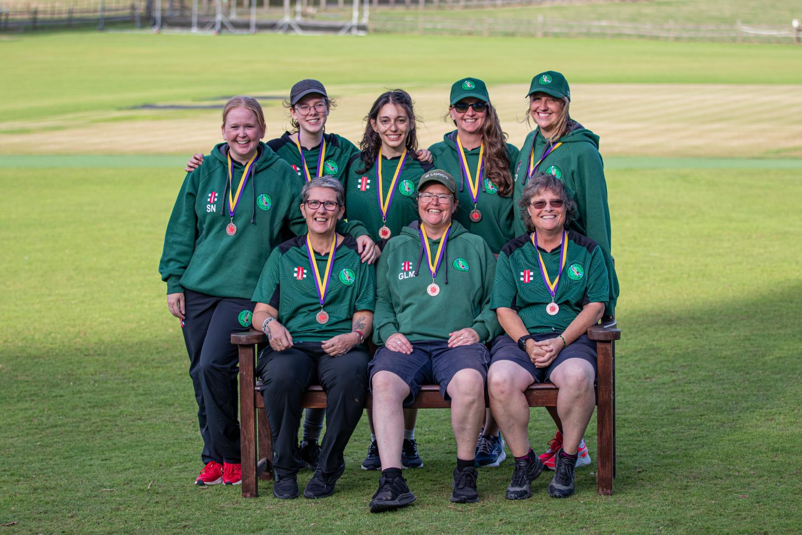 Caitlin Dawson (back, right) with Exwick CC at this year's Devon Women's Softball League Finals Day.
